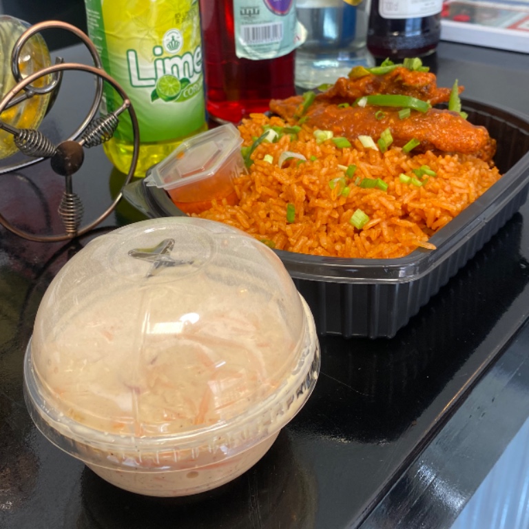 Jollof rice with turkey, chicken wings or pork